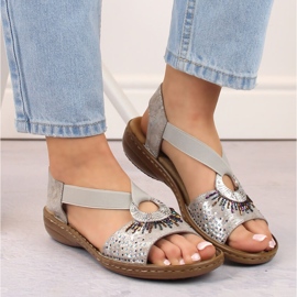 Comfortabele damesslip-on sandalen met metallic elastiek Rieker 60880-90 zilver 3