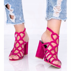 Roze opengewerkte sandalen op de Imani post 1